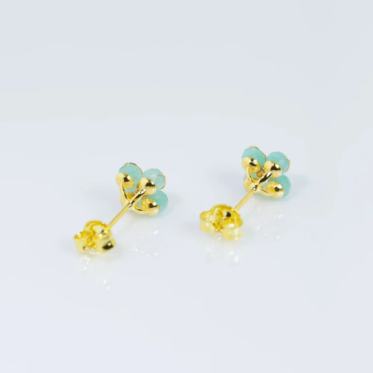 Green Riverstone flower stud earrings with gold accents, gemstone